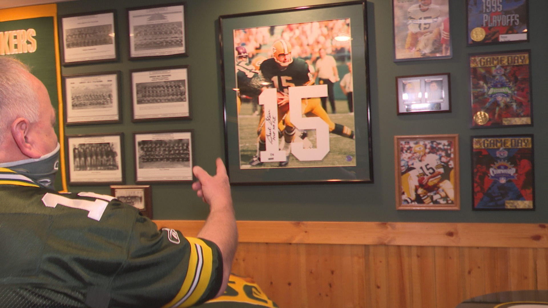 Packer fan shows off his ultimate green and gold fan cave