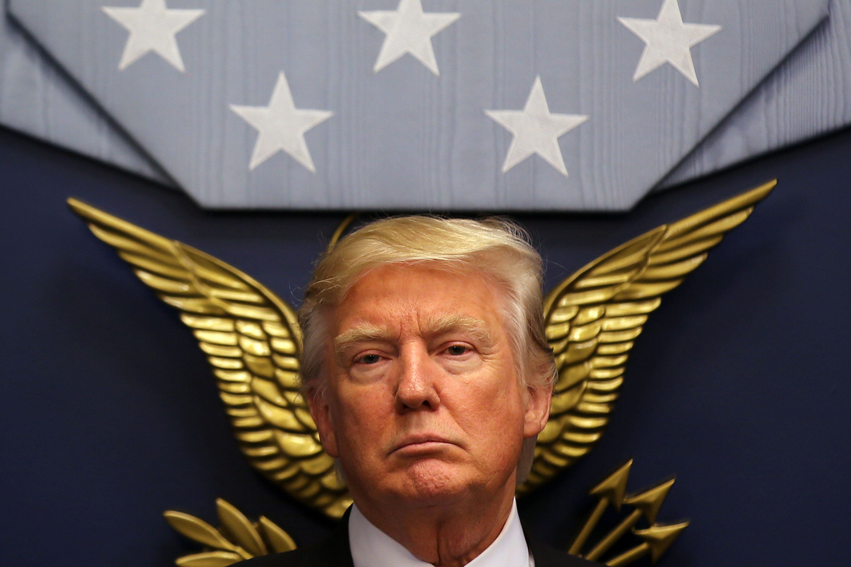 U.S. President Donald Trump looks on following a swearing-in ceremony for Defense Secretary James Mattis at the Pentagon in Washington, U.S.