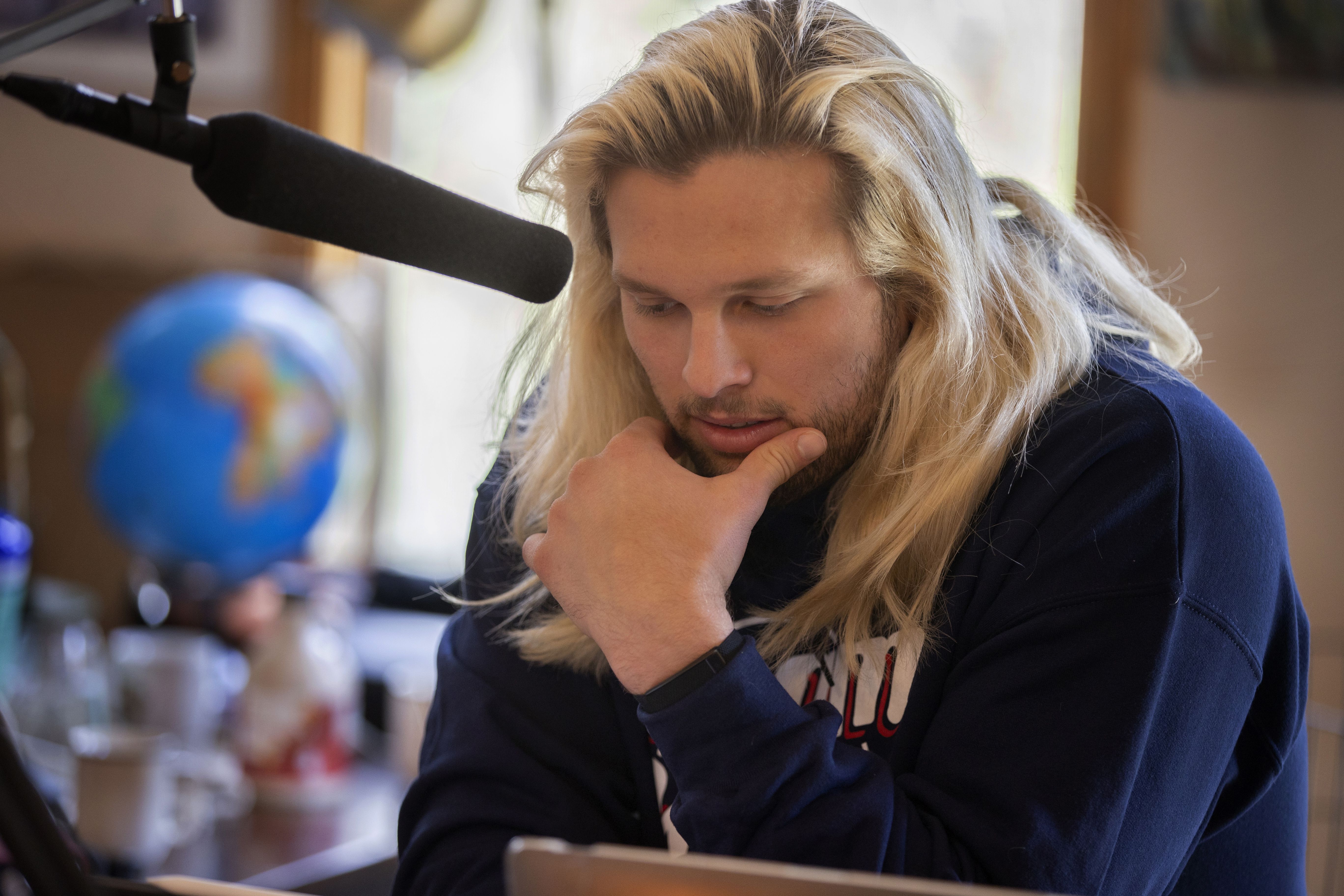 The story of why Chase Winovich cut his long hair