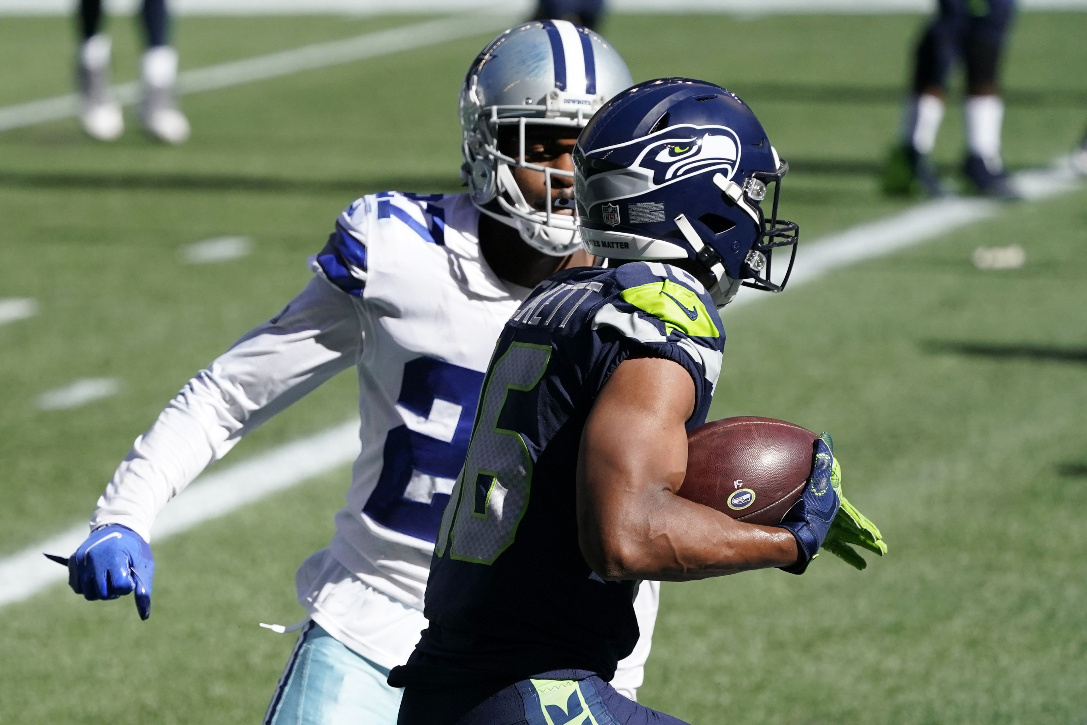 The Latest: Wilson rallies Seahawks past Cowboys 38-31