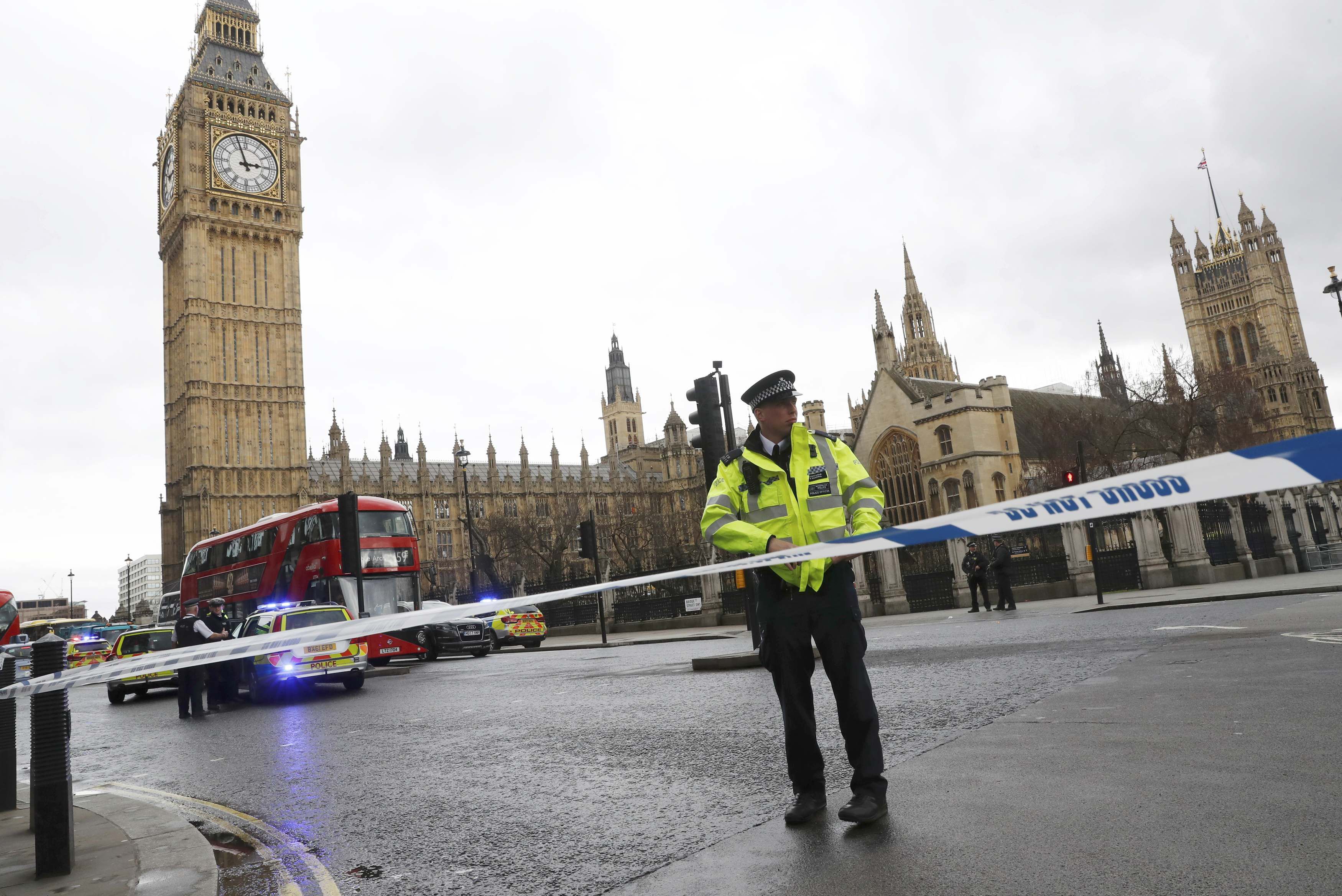 Police tapes off Parliament Square after reports of loud bangs, in London