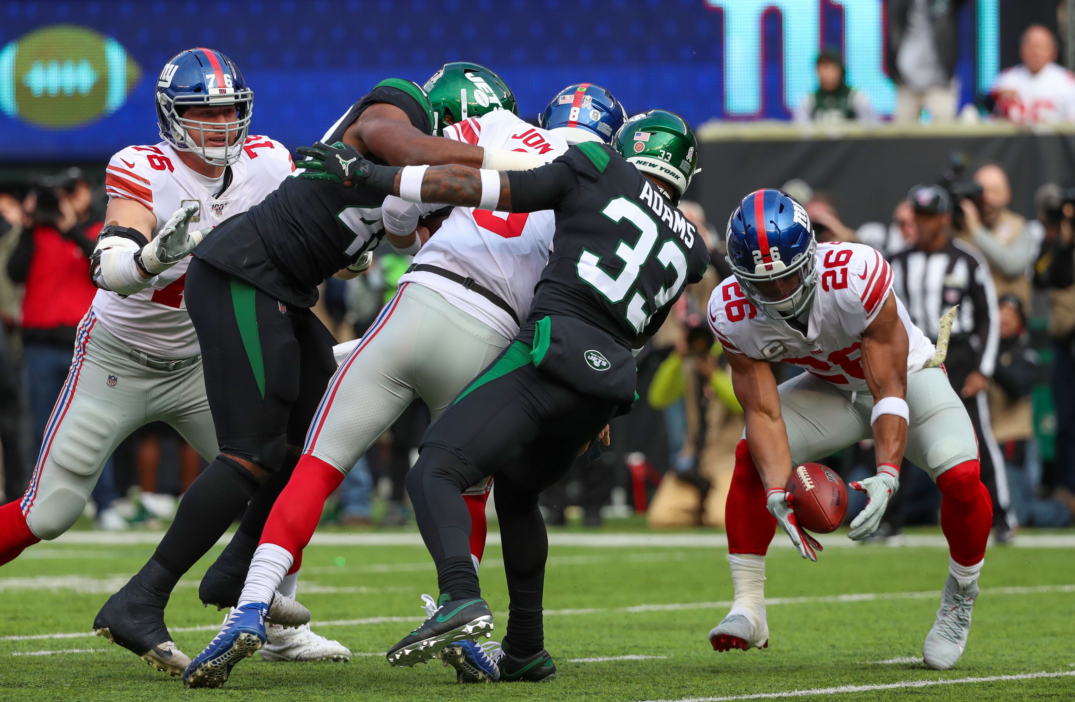 Eww York: Darnold, Jets hold on to beat Jones, Giants 34-27