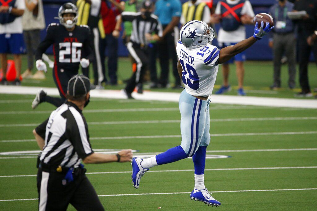 Cowboys' rally stuns Falcons 40-39 in McCarthy's home debut