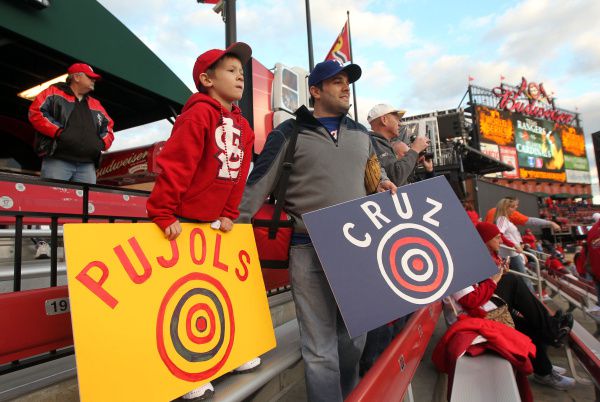 Pallbearers move the casket of former St. Louis Cardinals and