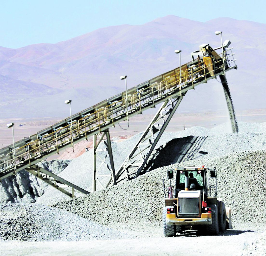 File photo of a bulldozer working in a stockpile of mineral at the Escondida copper mine near Antofagasta