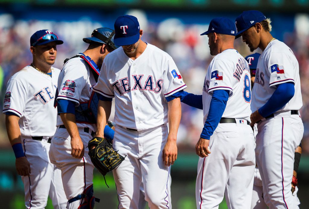 Baez hits 2 HRs as Cubs open season with 12-4 win at Rangers