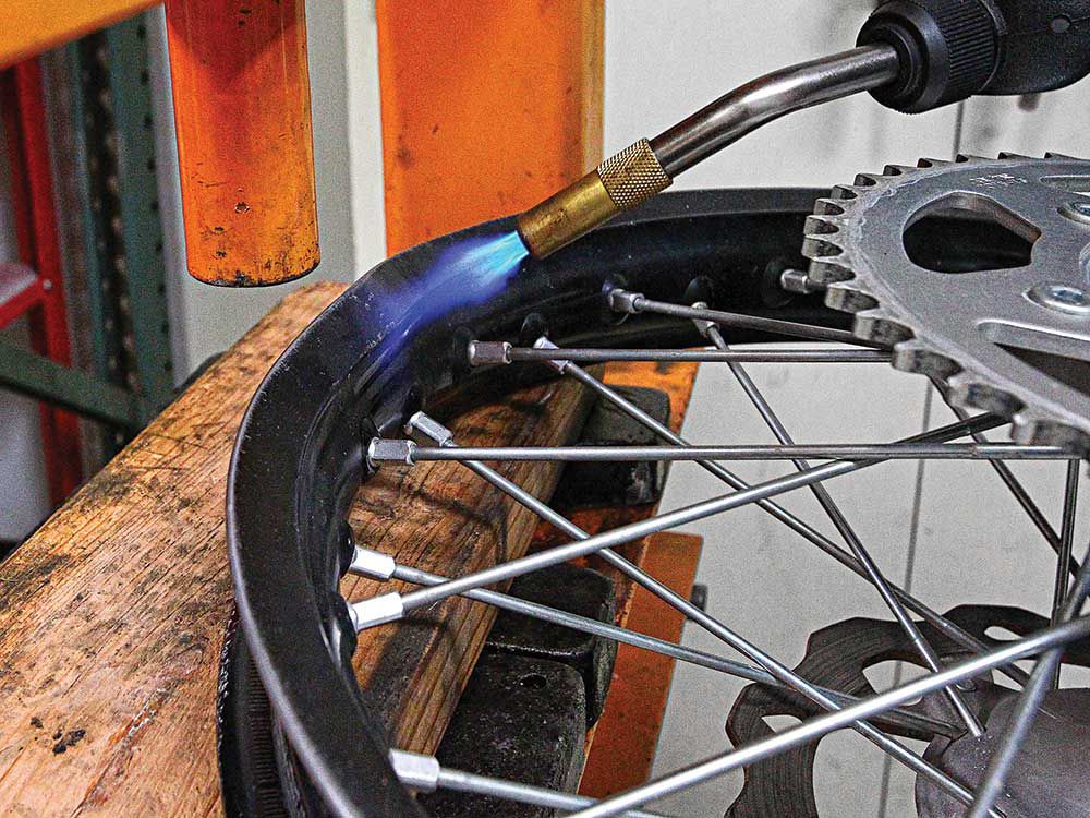 Fix bent bike wheel hot sale