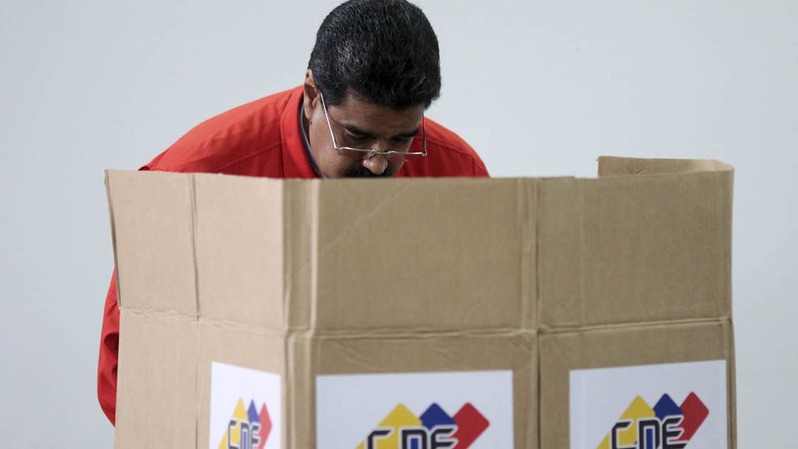 Venezuelan President Nicolas Maduro casts his vote during the Constituent Assembly election in Caracas