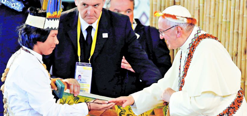 pope-francis-greets-a-member-of-an-indigeno-40538876