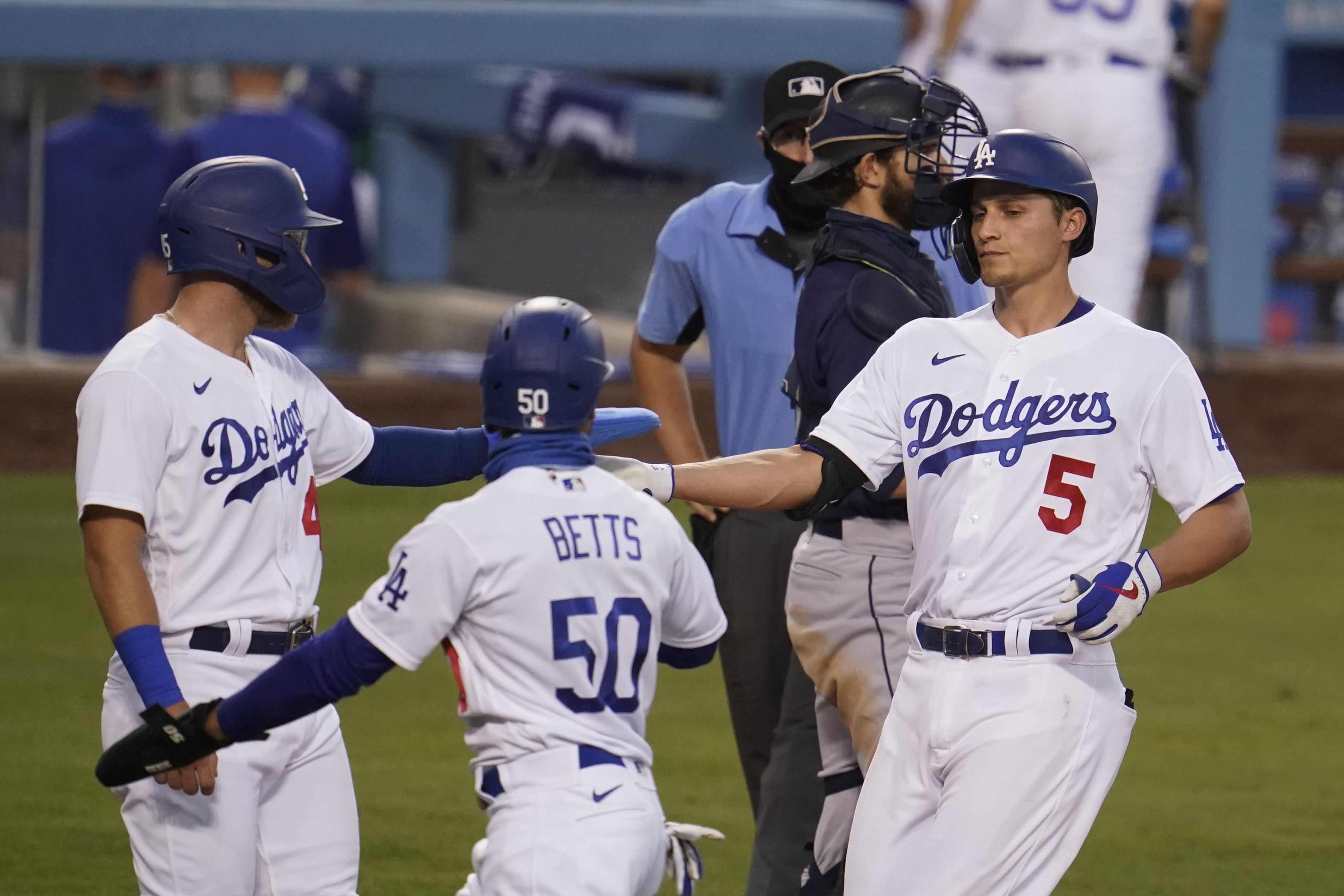 Corey Seager rejoins Dodgers from injured list as club amasses