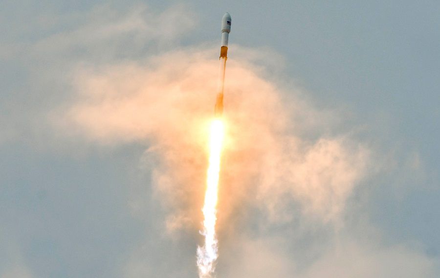 A SpaceX Falcon 9 lifts off from Pad 40 at Cape Canaveral Air Force Station Sunday, August 30, 2020. The rocket is carrying the