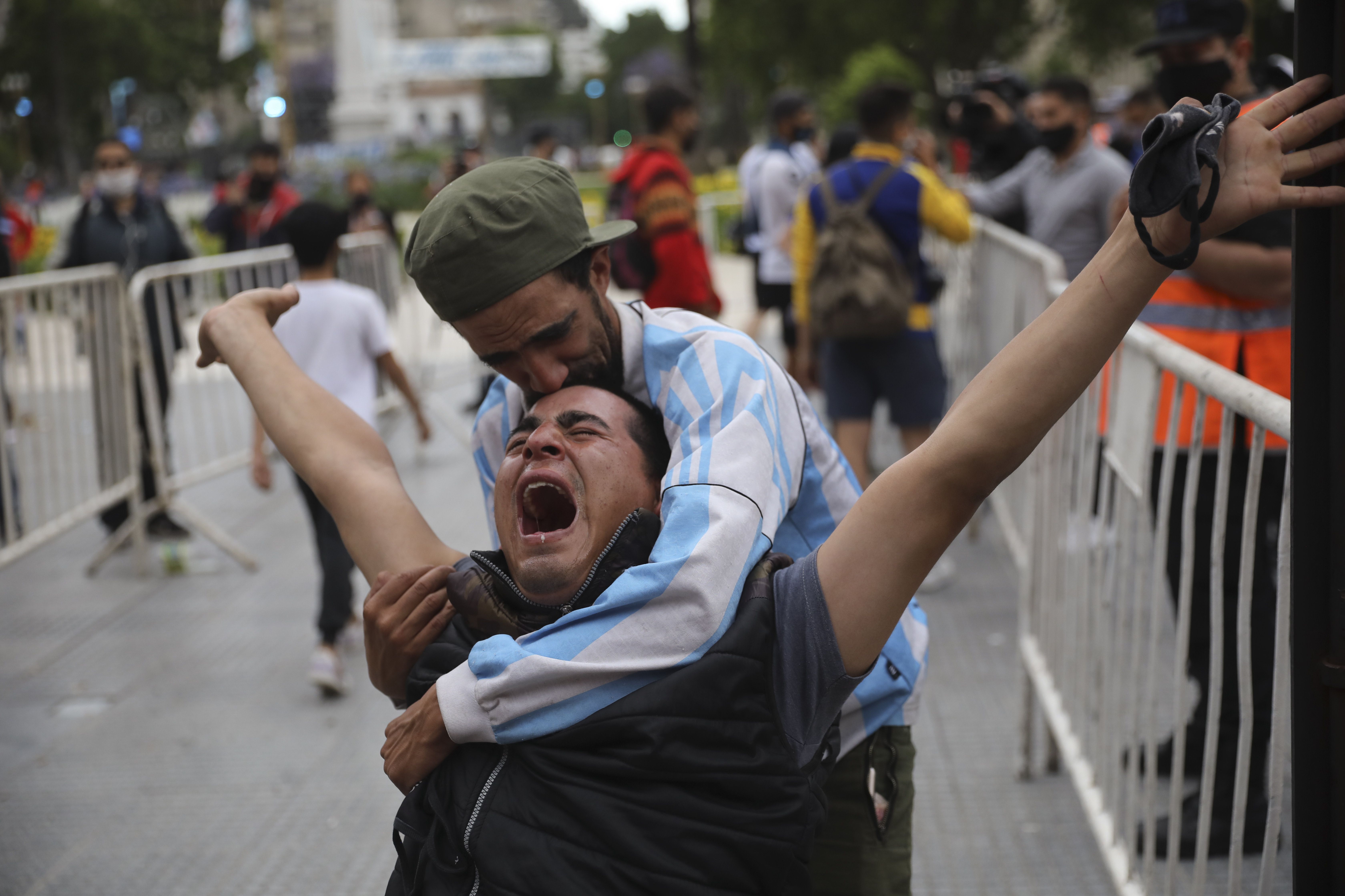 Argentines bid a raucous farewell to Maradona amid clashes