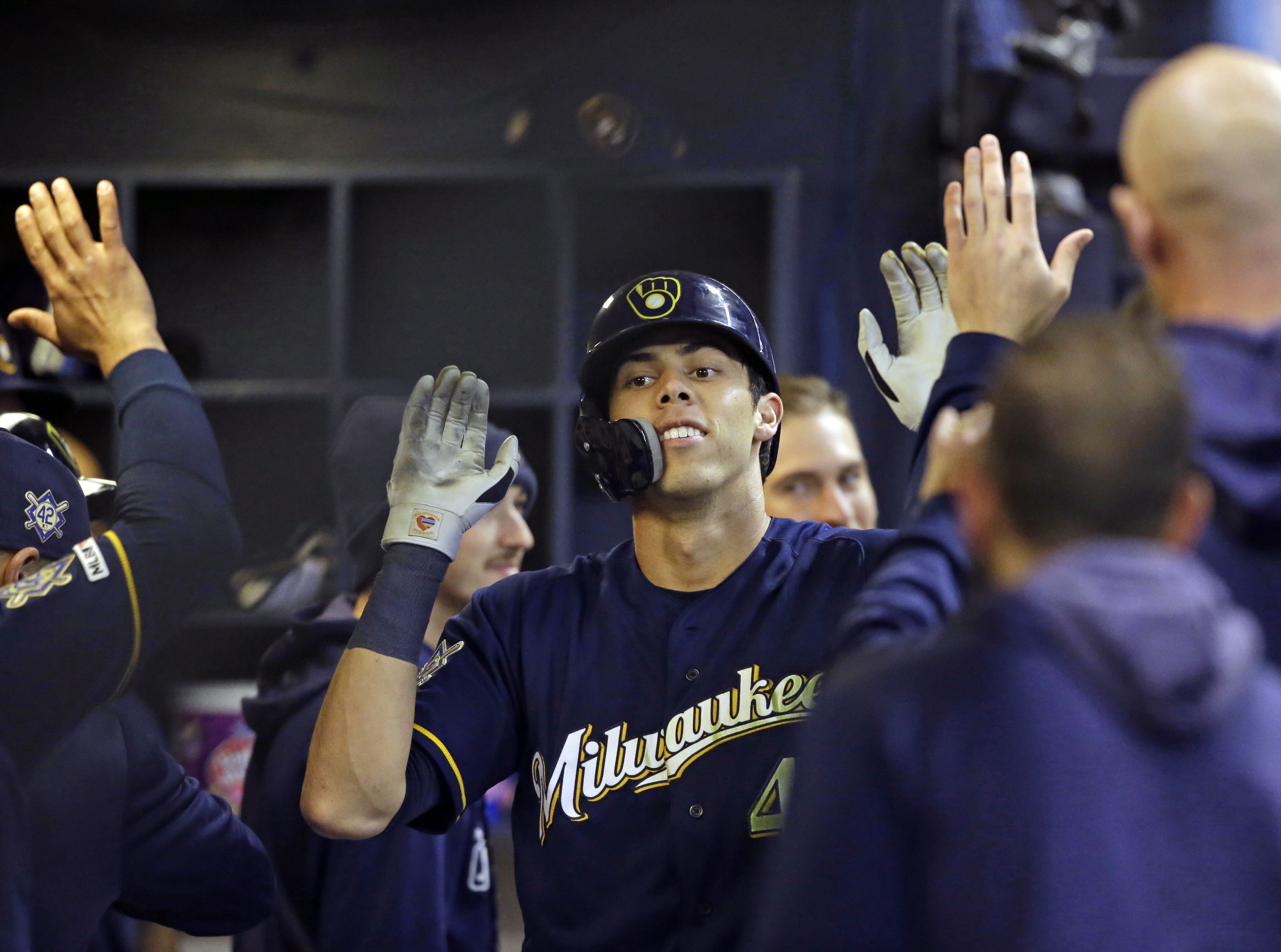 Eric Thames' home run in 14th, Christian Yelich's 2 help Milwaukee