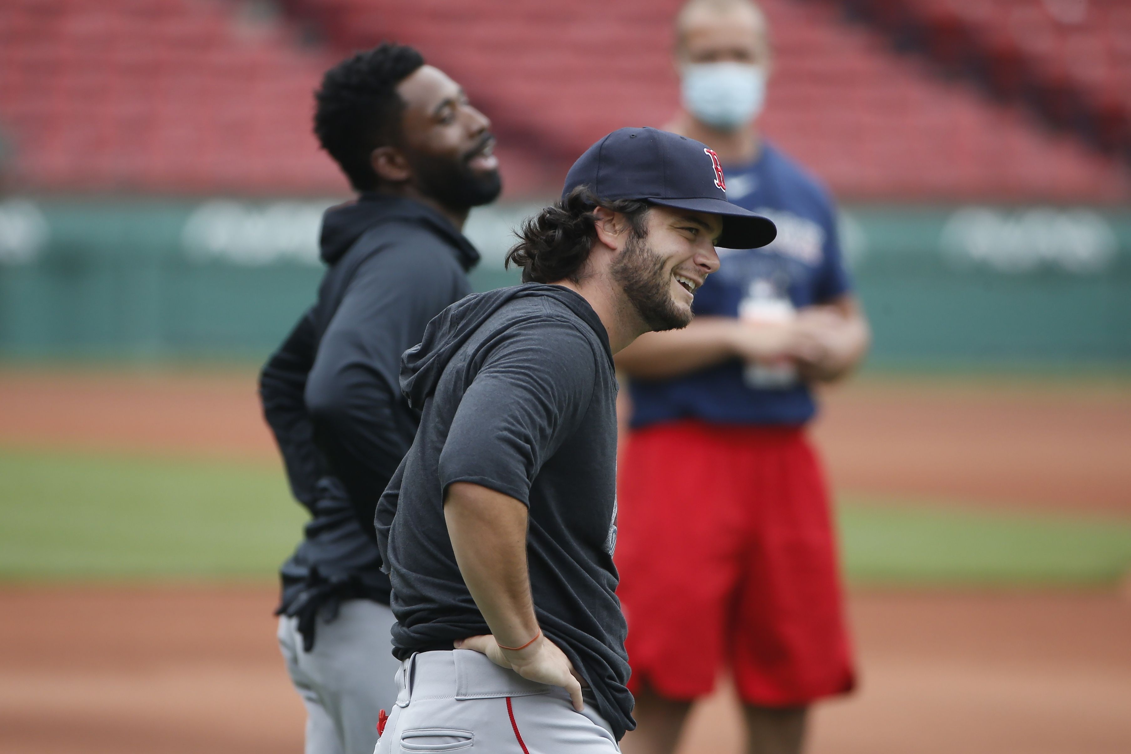 Boston Red Sox's Martin Perez makes cheese with hands at ranch