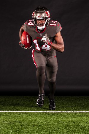 'New but familiar' Bucs uniforms a nod to Super Bowl era, with all-pewter  look - The Athletic