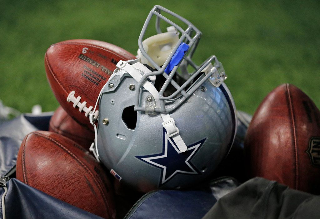 Closeup of Dallas Cowboys fan in oversized cowboy hat at preseason