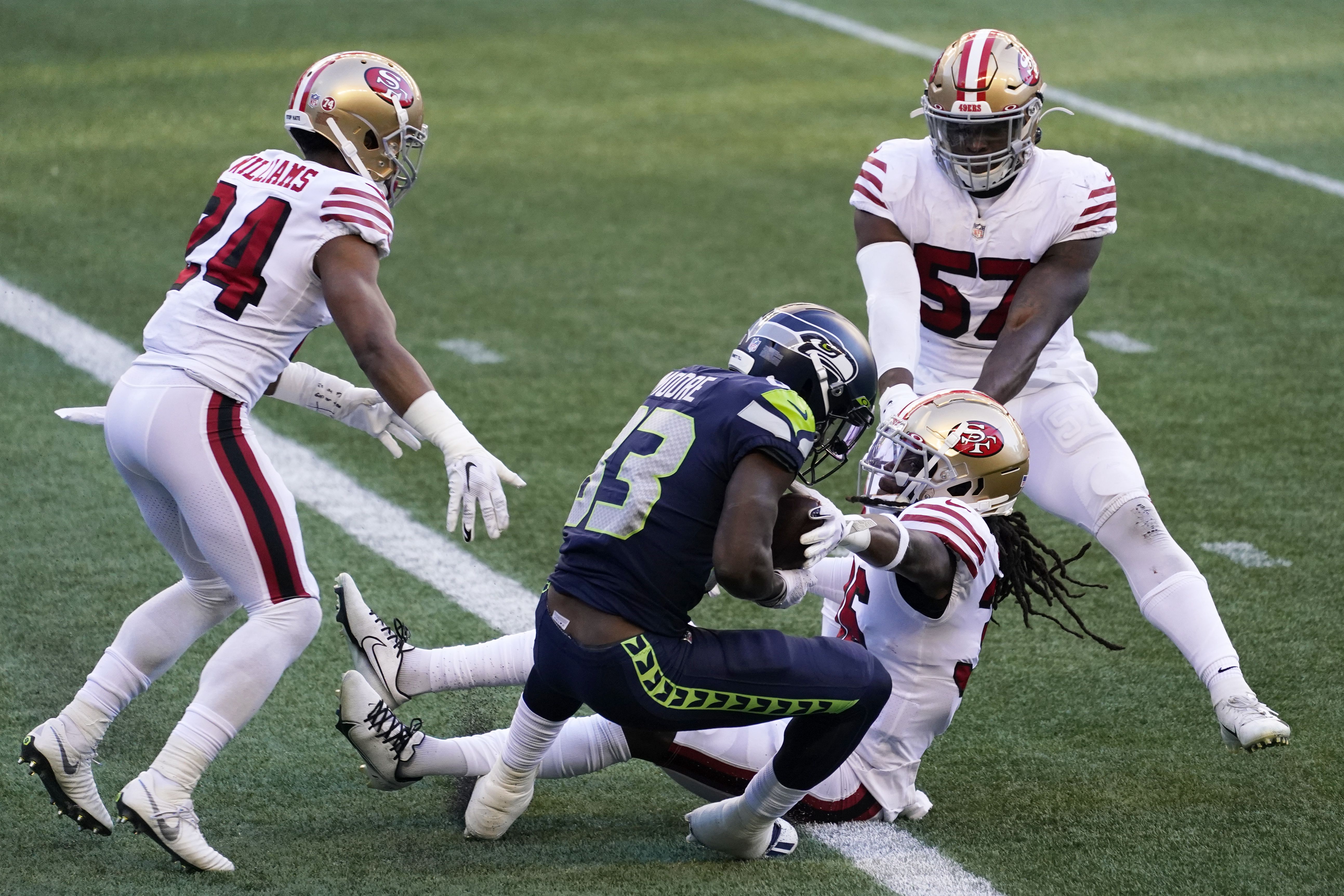 Russell Wilson's throws four TD passes as the Seattle Seahawks roll past  the San Francisco 49ers: Live updates recap, score, stats and more 