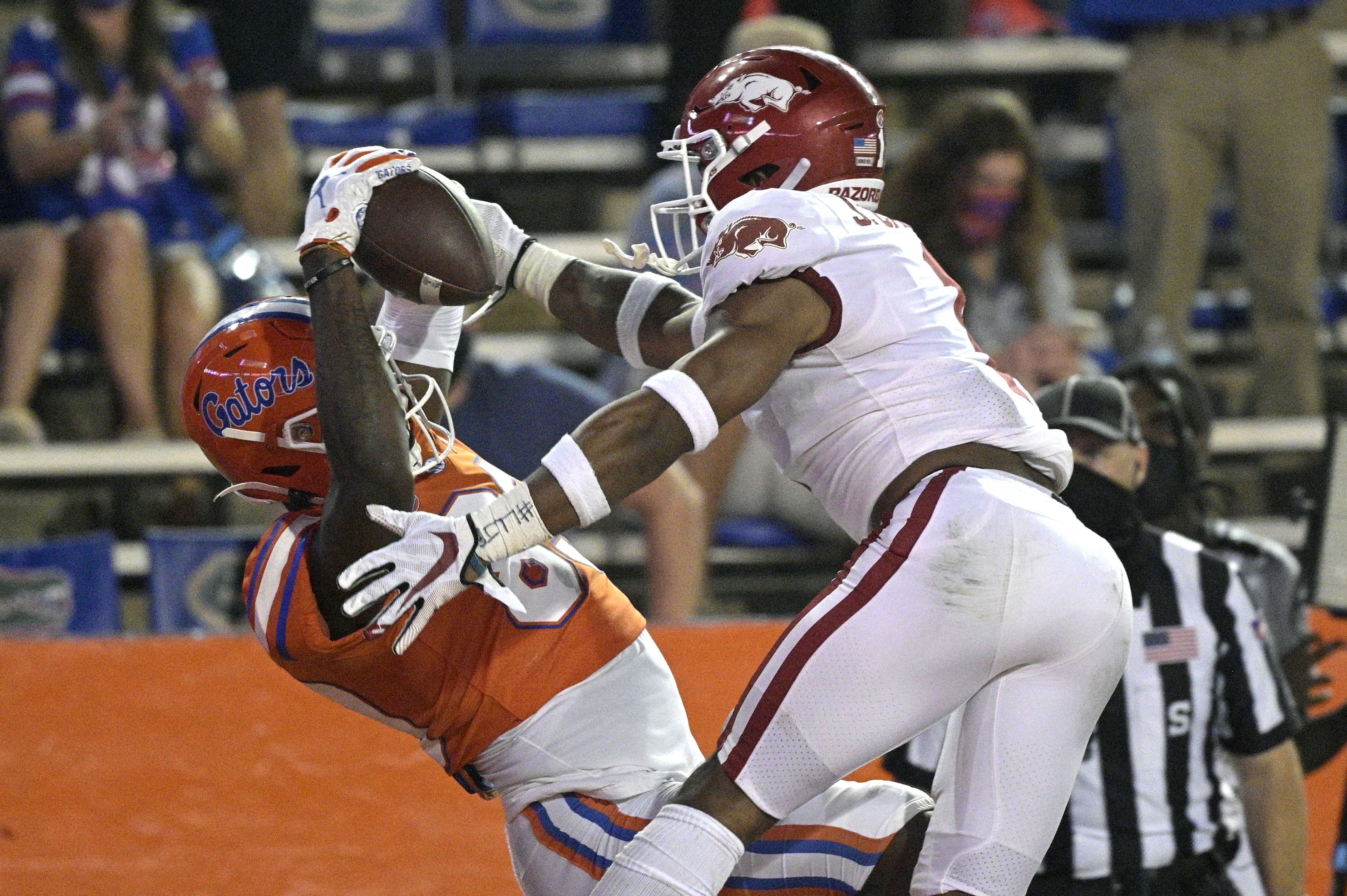 College Football: Trask, No. 6 Florida thump Hogs 63-35