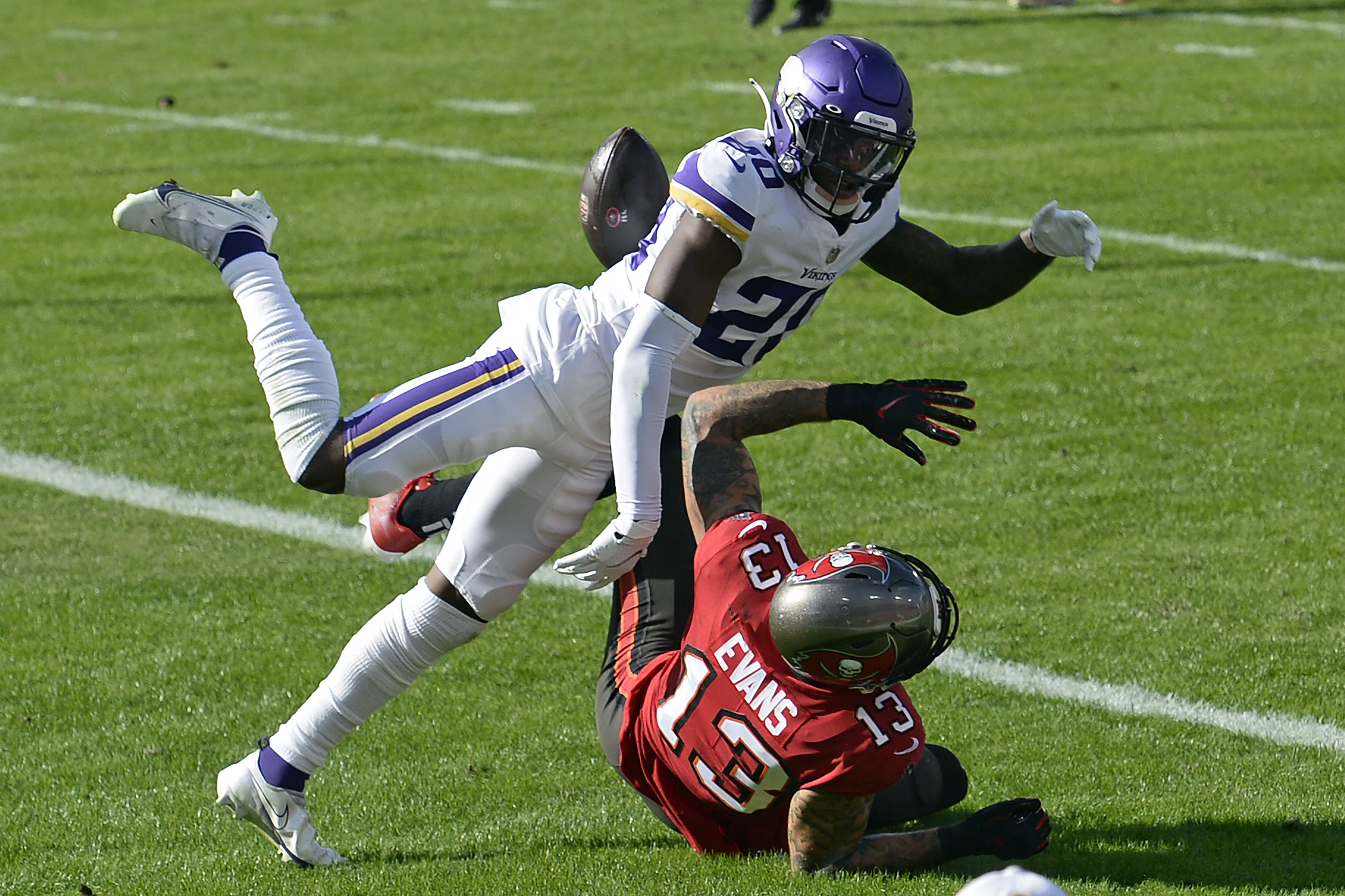 Minnesota Vikings fullback C.J. Ham (30) celebrates after his touchdown  with offensive tackle Brian O'Neill, right, in the second half of an NFL  football game against the Buffalo Bills, Sunday, Nov. 13