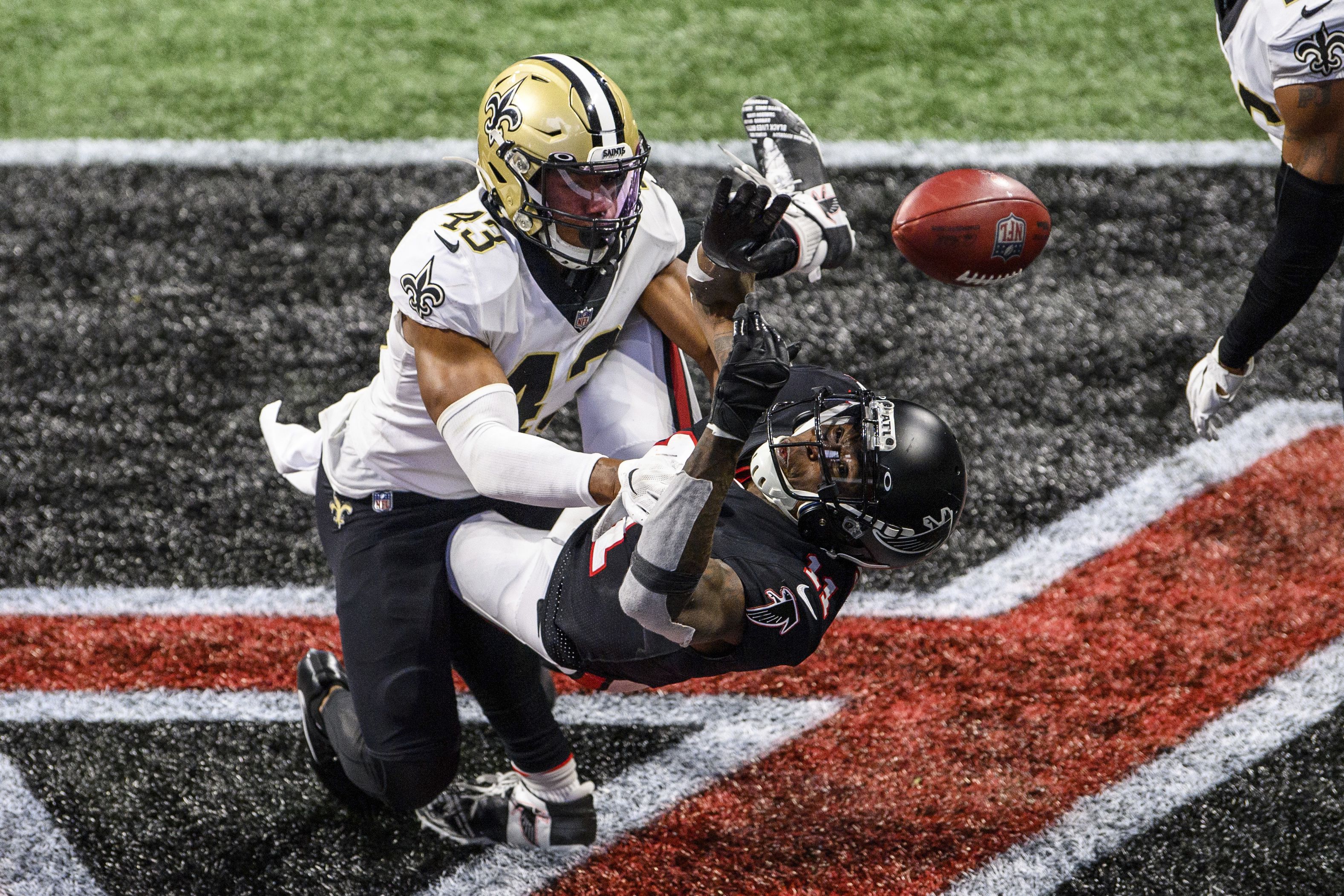 WATCH: Julio Jones comes down with improbable catch on sideline off  defender's helmet