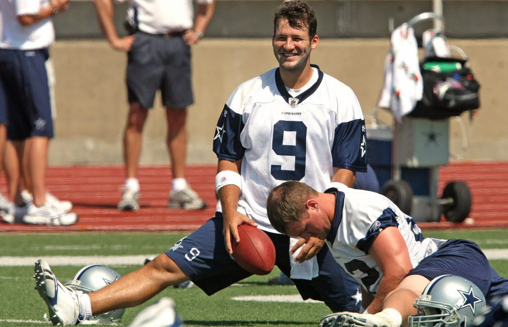 Dallas Cowboyts tight end Jason Witten (82) talks with quarterback Tony Romo  (9) during Cowboys training camp at the Alamo Dome in San Antonio, Texas,  Friday, July 29, 2011. (Photo by Paul