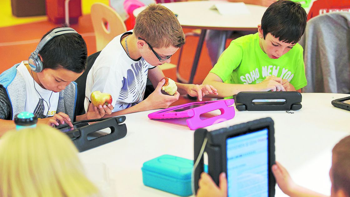 Students practise on their iPads at the Steve Jobs school in Sneek