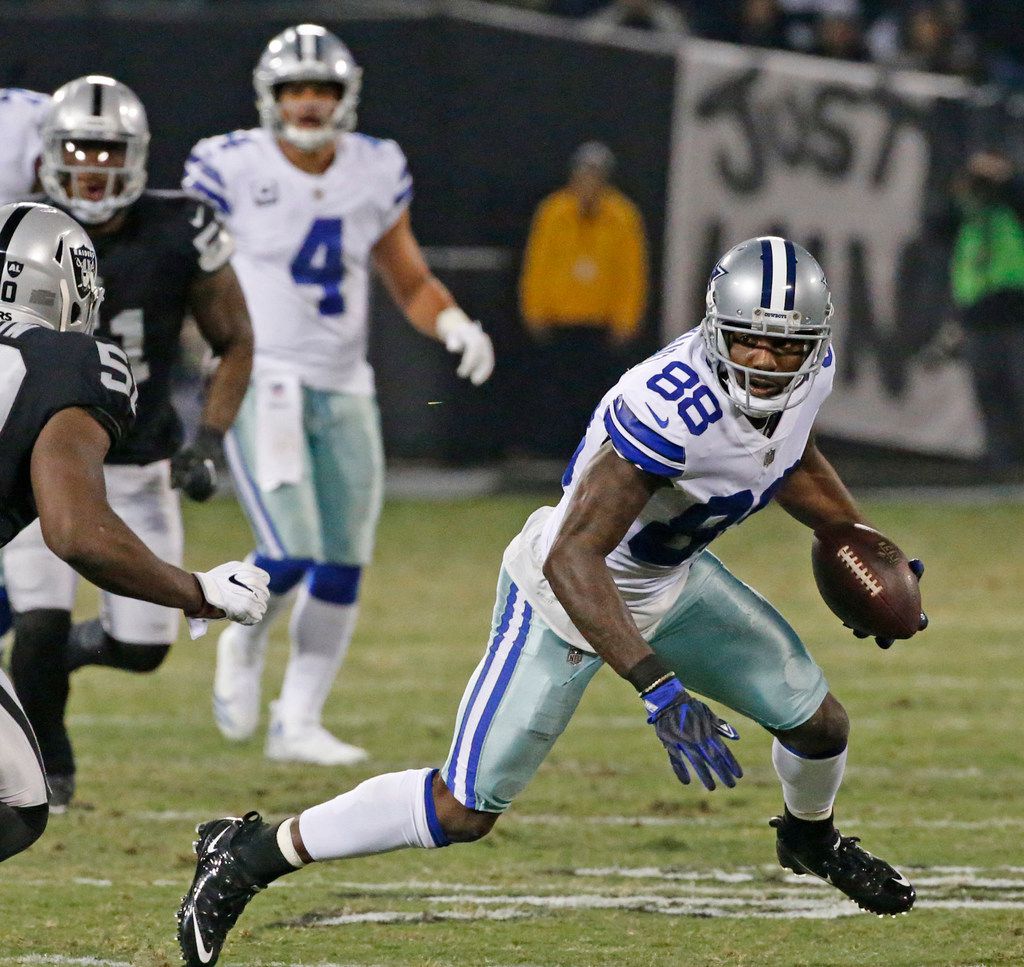 Injured Dallas Cowboys wide receiver Dez Bryant roams the sidelines during  an NFL football game against the San Francisco 49ers Sunday, Oct. 2, 2016,  in Santa Clara, CA. The Cowboys won 24-17. (