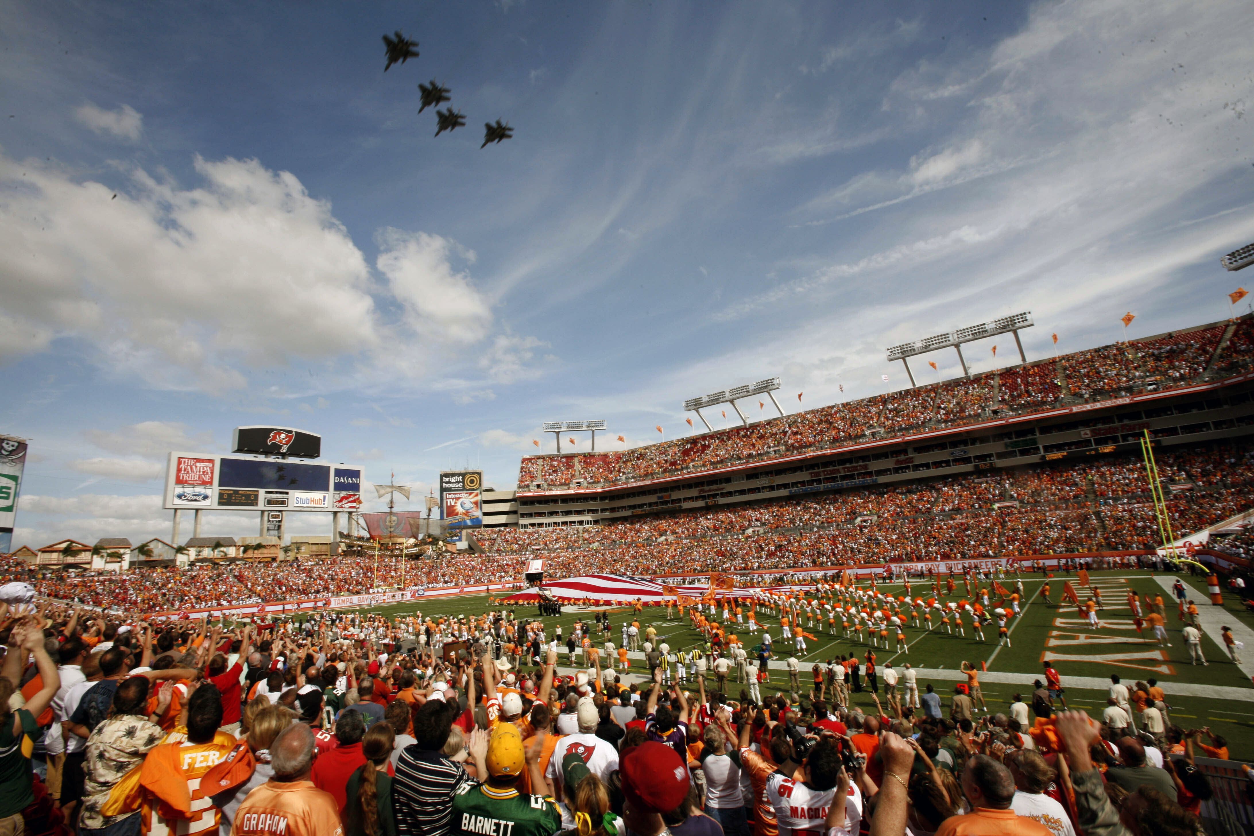 Fans cheer before an NFL football game between the Los Angeles