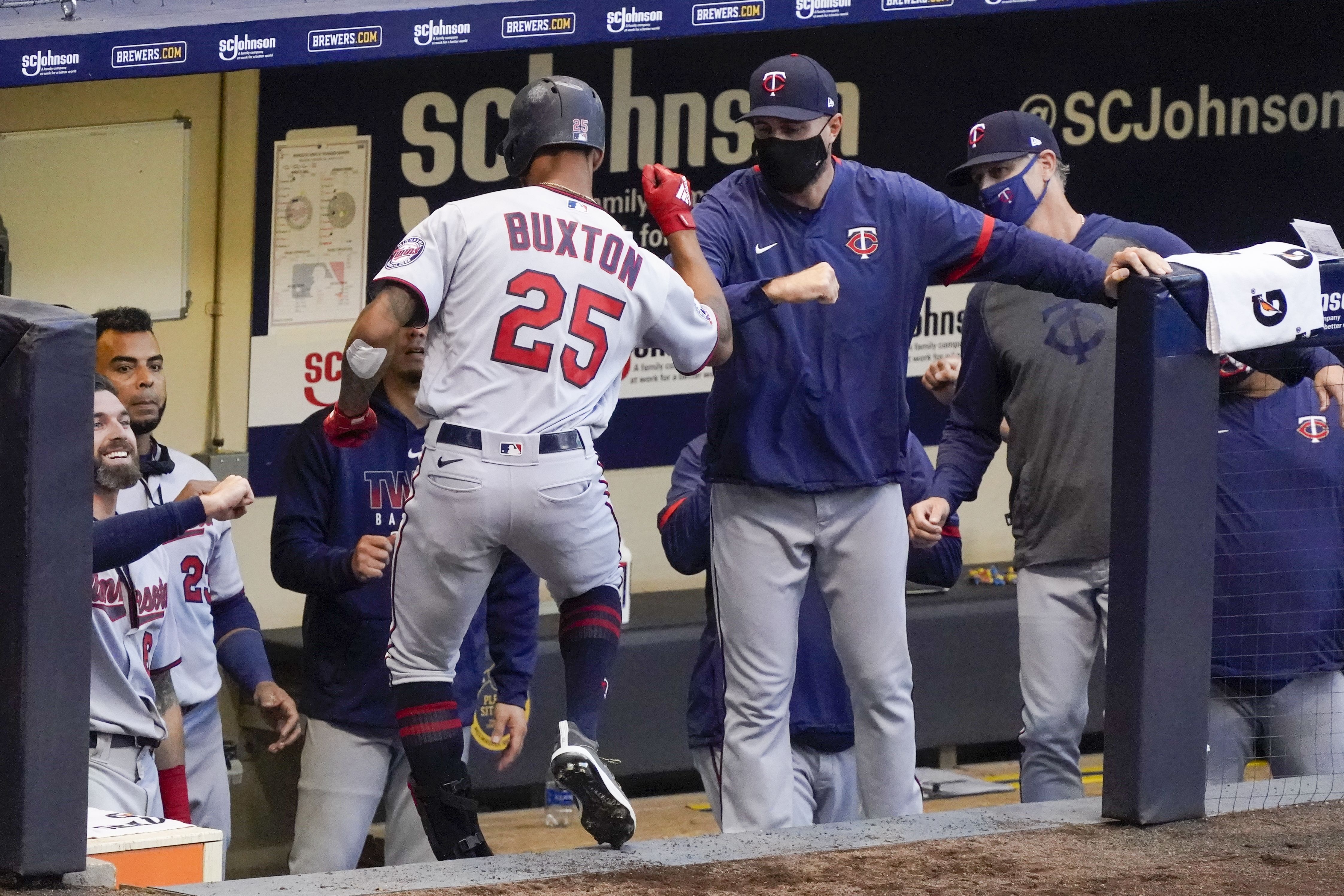 Twins rout Brewers, 12-2, behind Kenta Maeda