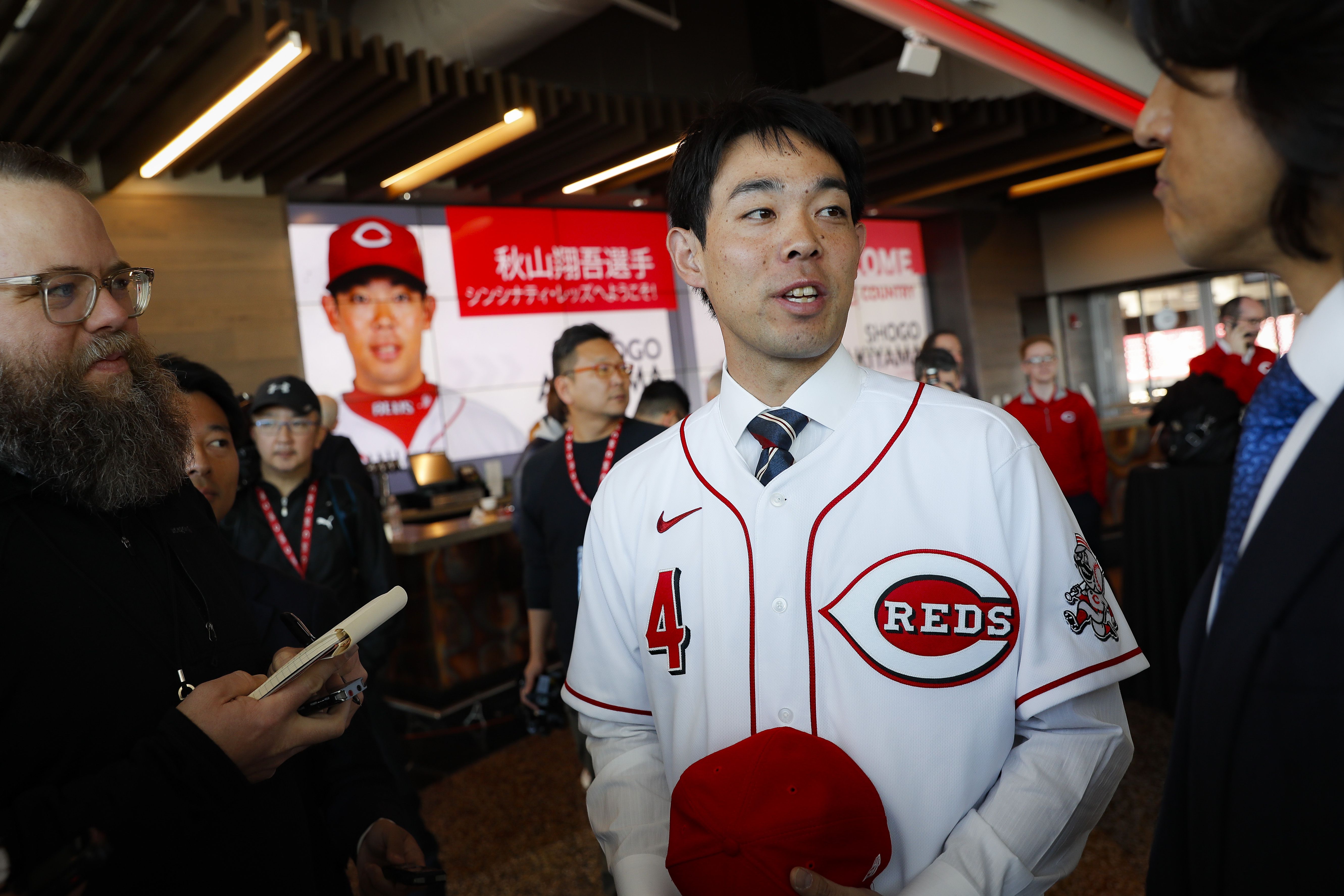 Reds outfielder Akiyama released