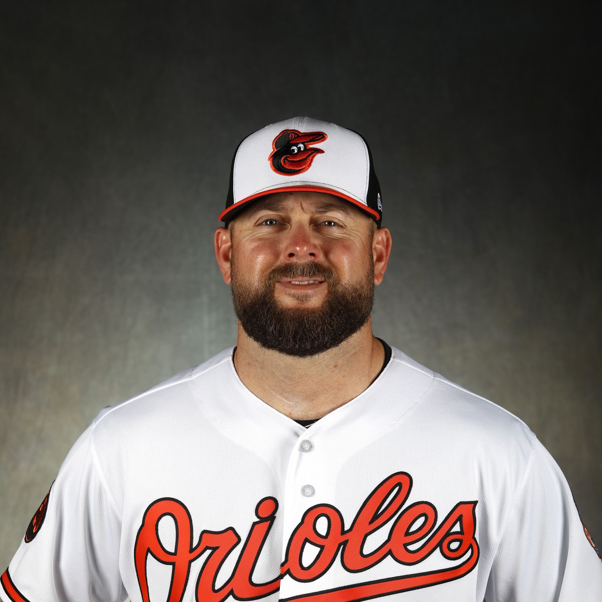 Pitching coach Chris Holt of the Baltimore Orioles talks to his
