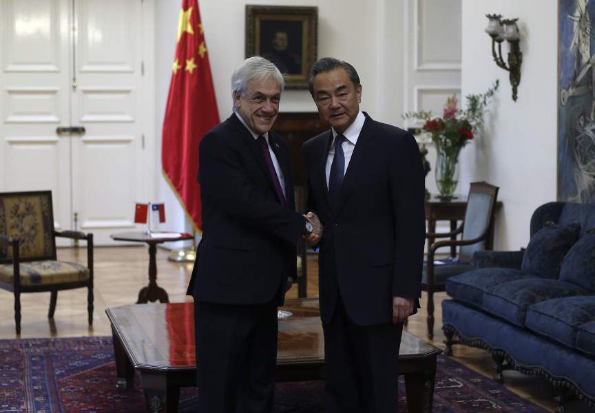 Piñera recibió en la moneda a Wang Yi