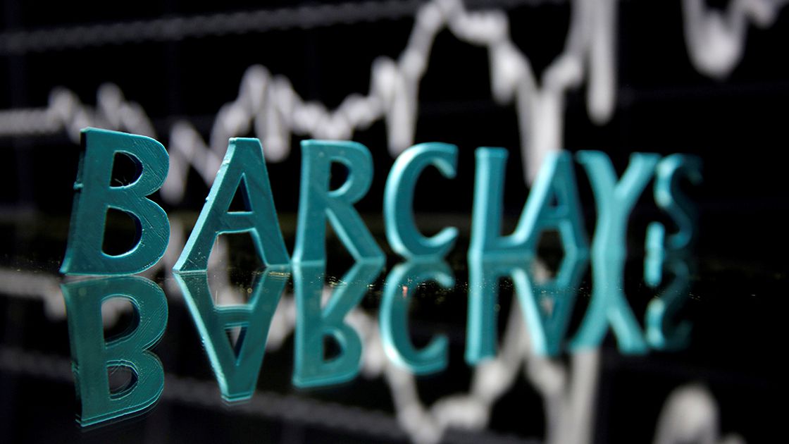 FILE PHOTO: The Barclays logo is seen in front of displayed stock graph in this illustration