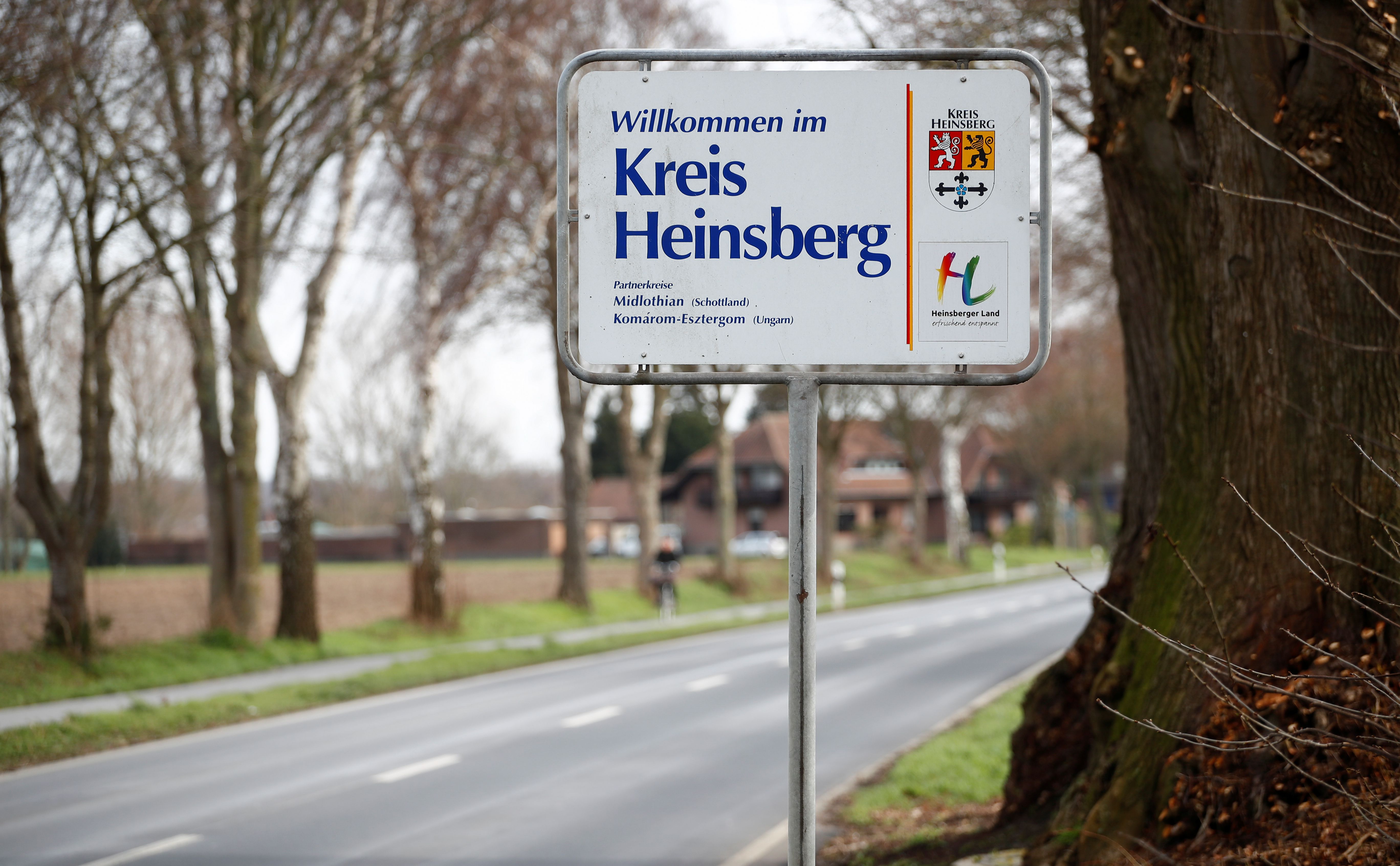 A sign reading "Welcome to the Heinsberg county" is pictured in the western German administrative district of Heinsberg, near Gangelt