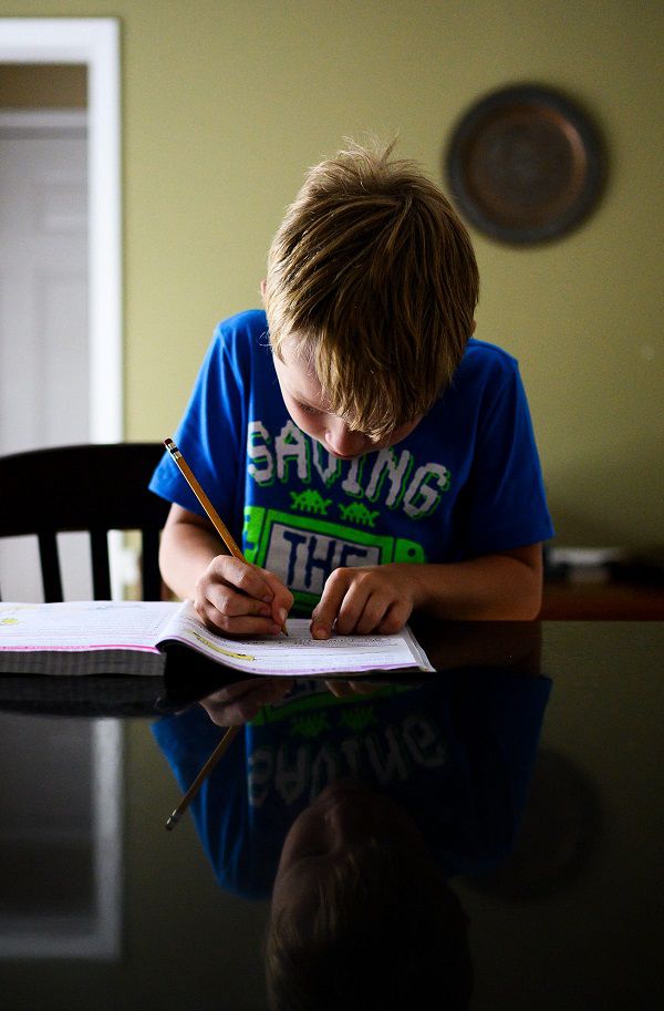 Woodland Elementary School student William Gordon, 8, does compound sentence exercises at home Monday, Aug. 24, 2020.Jm