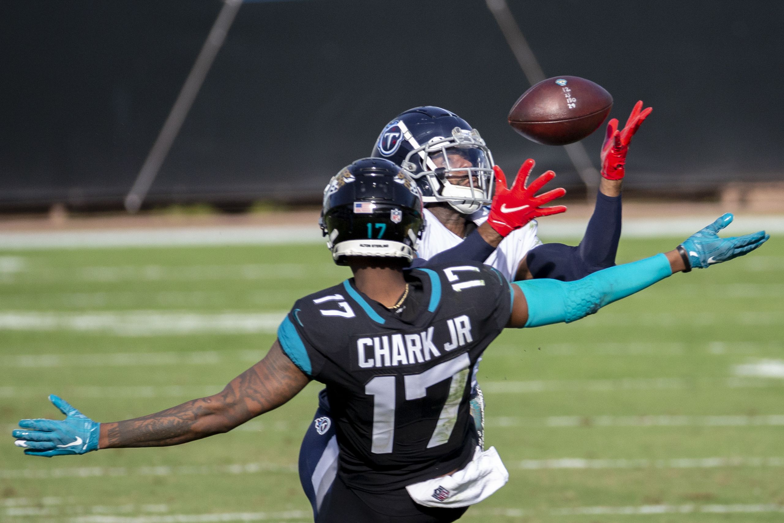 Henry runs for 215 yards, Titans beat Jaguars, 31-10