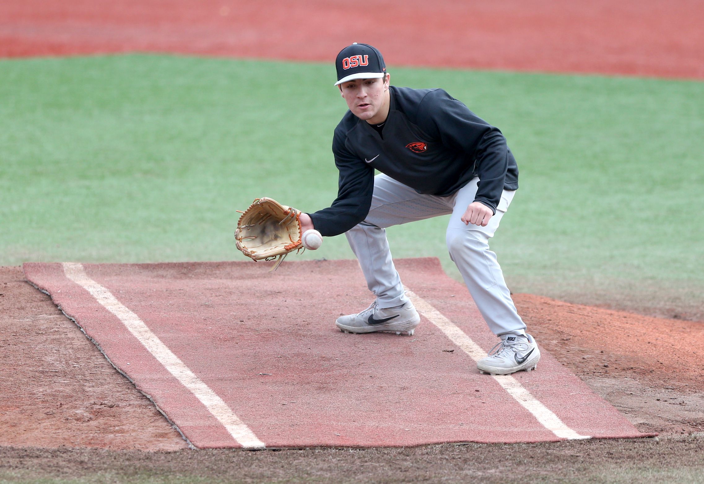 Oregon State catcher Adley Rutschman is the Pac-12 baseball player of the  year, joins Beavers Alex McGarry, Jake Mulholland on conference first team  