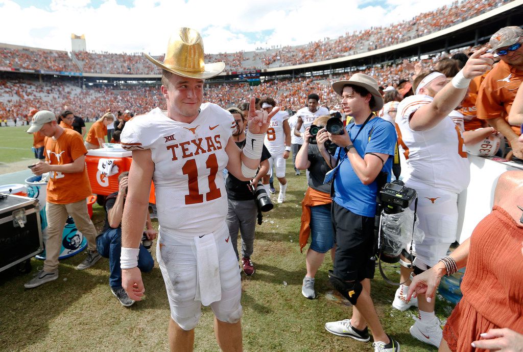 Longhorns' Sam Ehlinger wears Drew Brees Westlake HS jersey prior