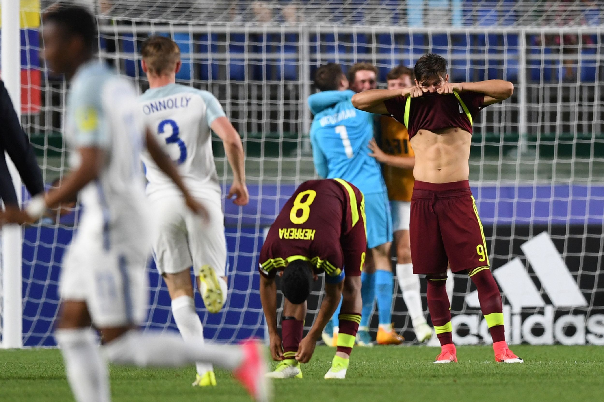 Venezuela's midfielder Yangel Herrera (#8) and Venezuela's forward Ro