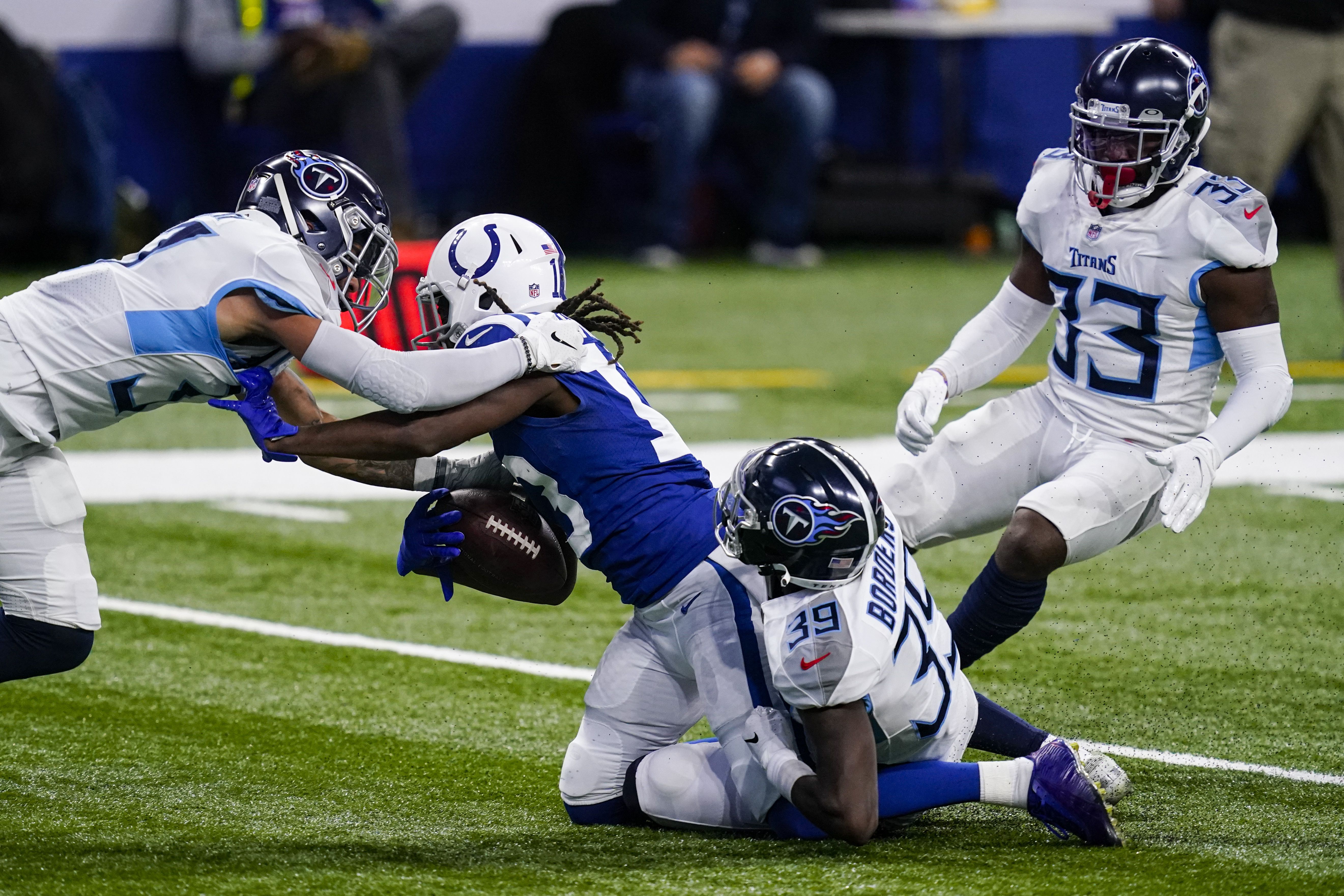 Henry leads Titans' run to AFC South lead 45-26 over Colts