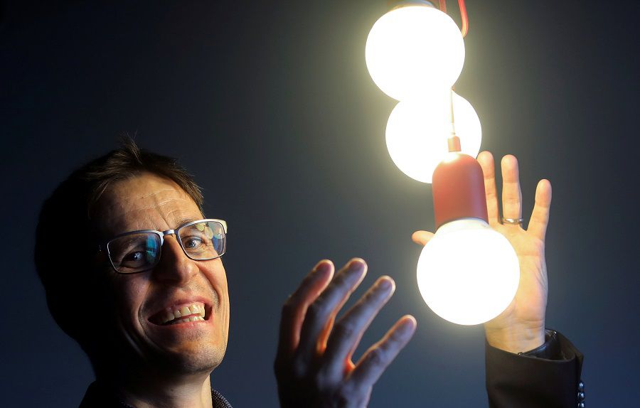 Swiss scientist Didier Queloz poses for a picture at a news conference, following the announcement he wins the 2019 Nobel Prize for Physics, in London