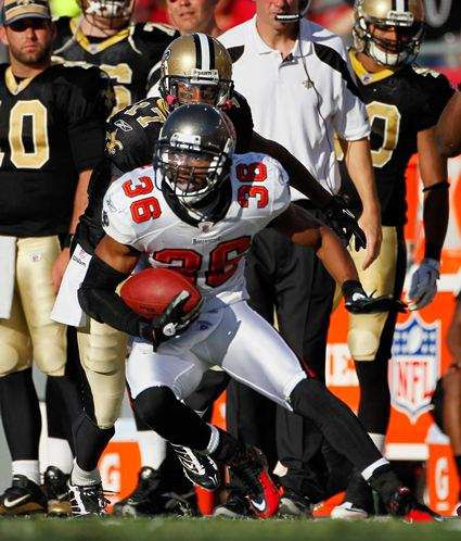 Tampa Bay Buccaneers safety Tanard Jackson (R) hits Seattle