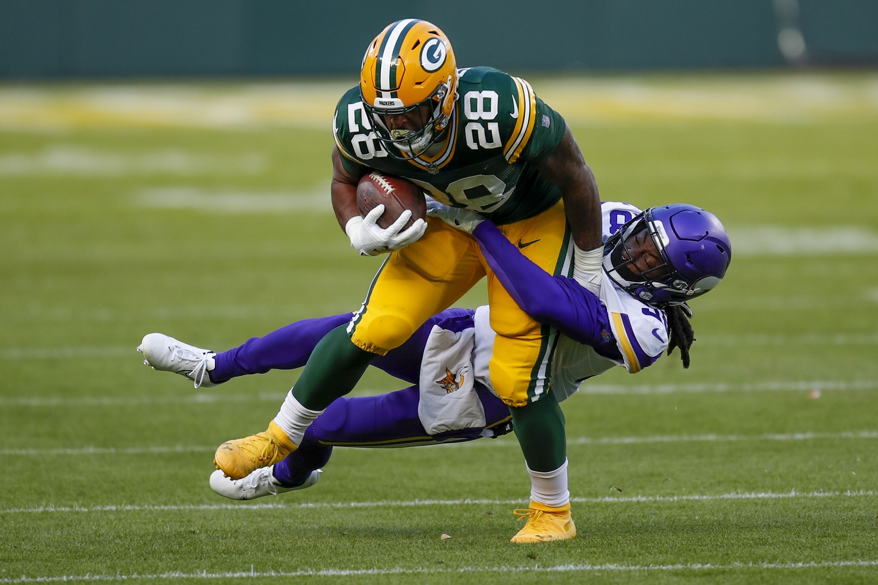 Cook's 4 TDs help Vikings knock off Packers 28-22