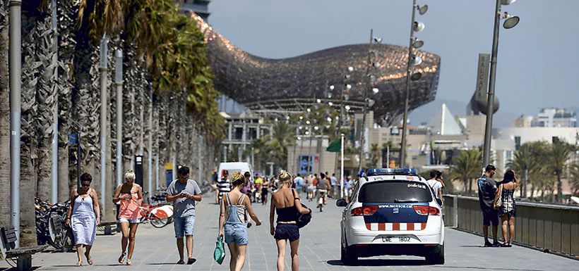 a-spanish-police-vehicle-patrols-on-a-pedes-38814125