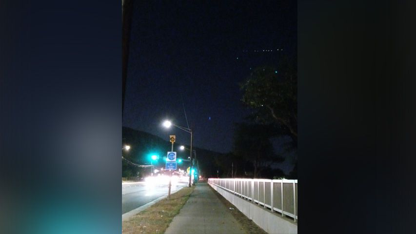 FAA notified after large blue UFO seen above Oahu appeared to drop