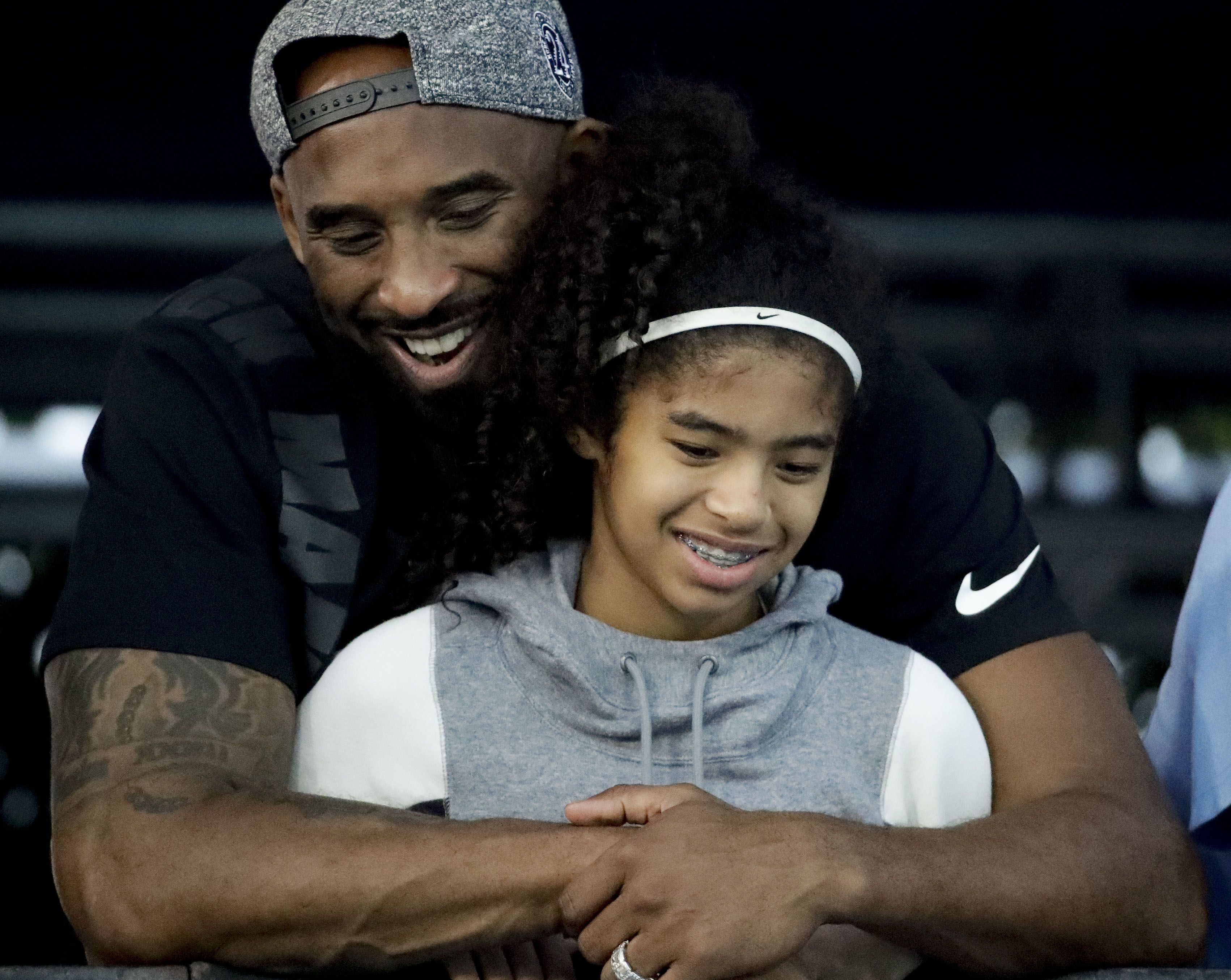 Kobe Bryant and daughter Gianna sit courtside to watch Los Angeles