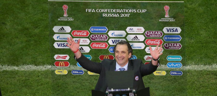 Chile's Spanish coach Juan Antonio Pizzi reacts after his team clinch