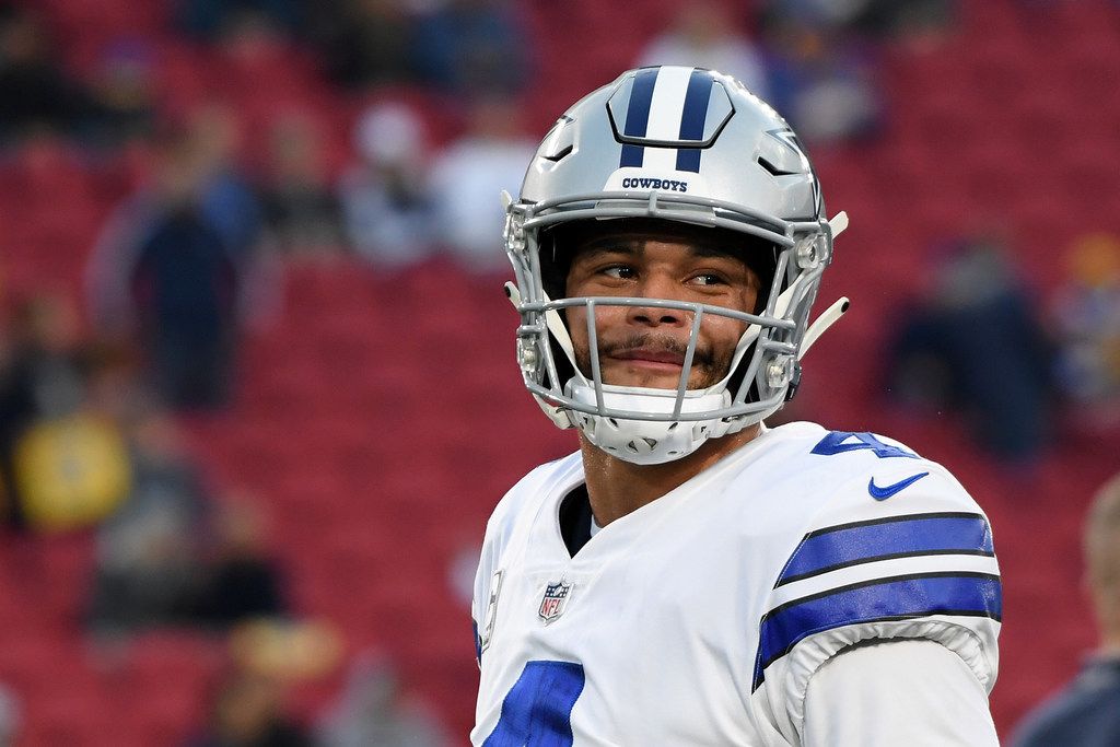 A decal for the Walter Payton NFL Man of the Year Award is seen on the  helmet of Dallas Cowboys quarterback Dak Prescott during the first half of  an NFL football game