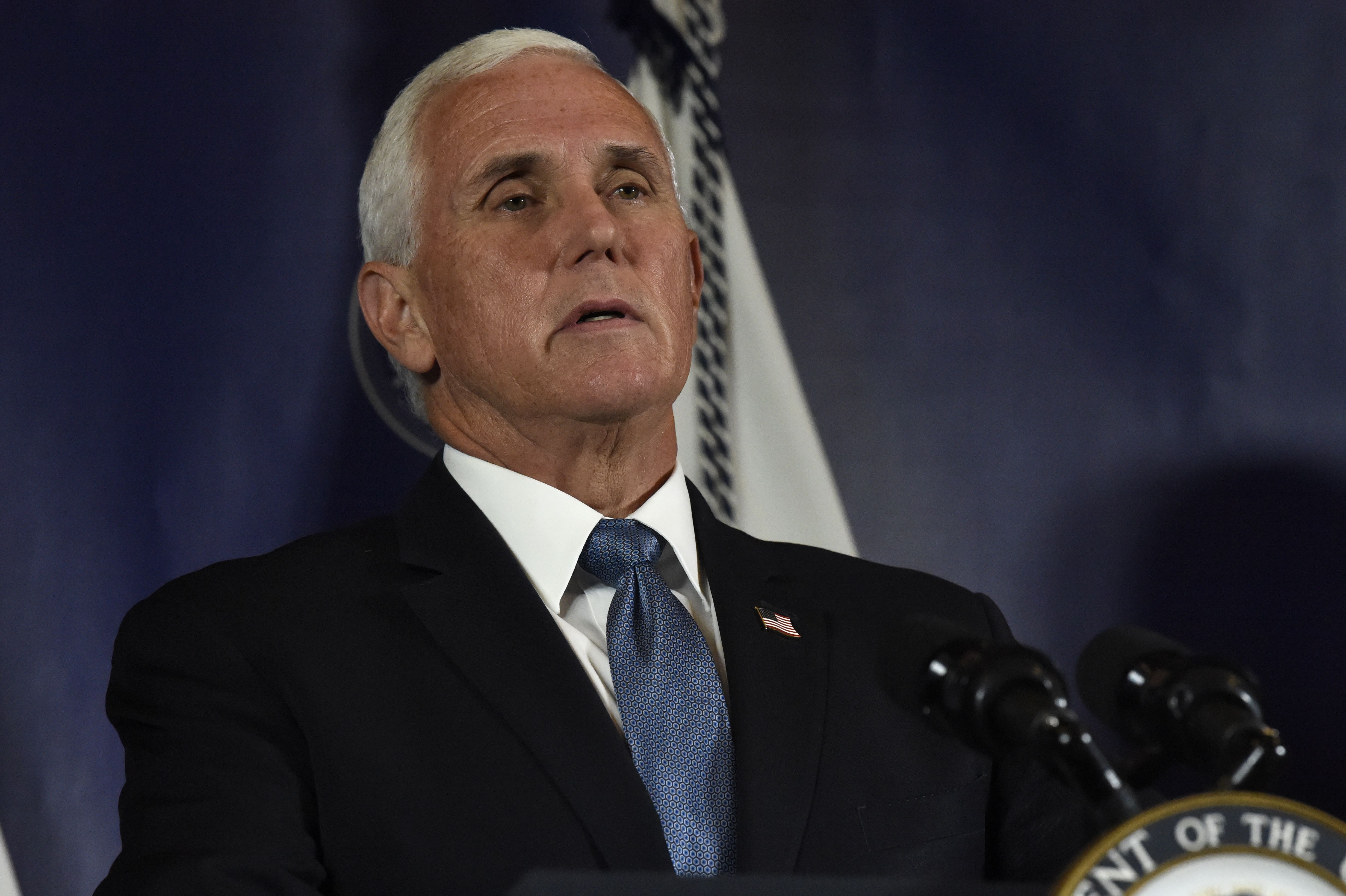 Pence defends outbreak response pushes against shutdowns