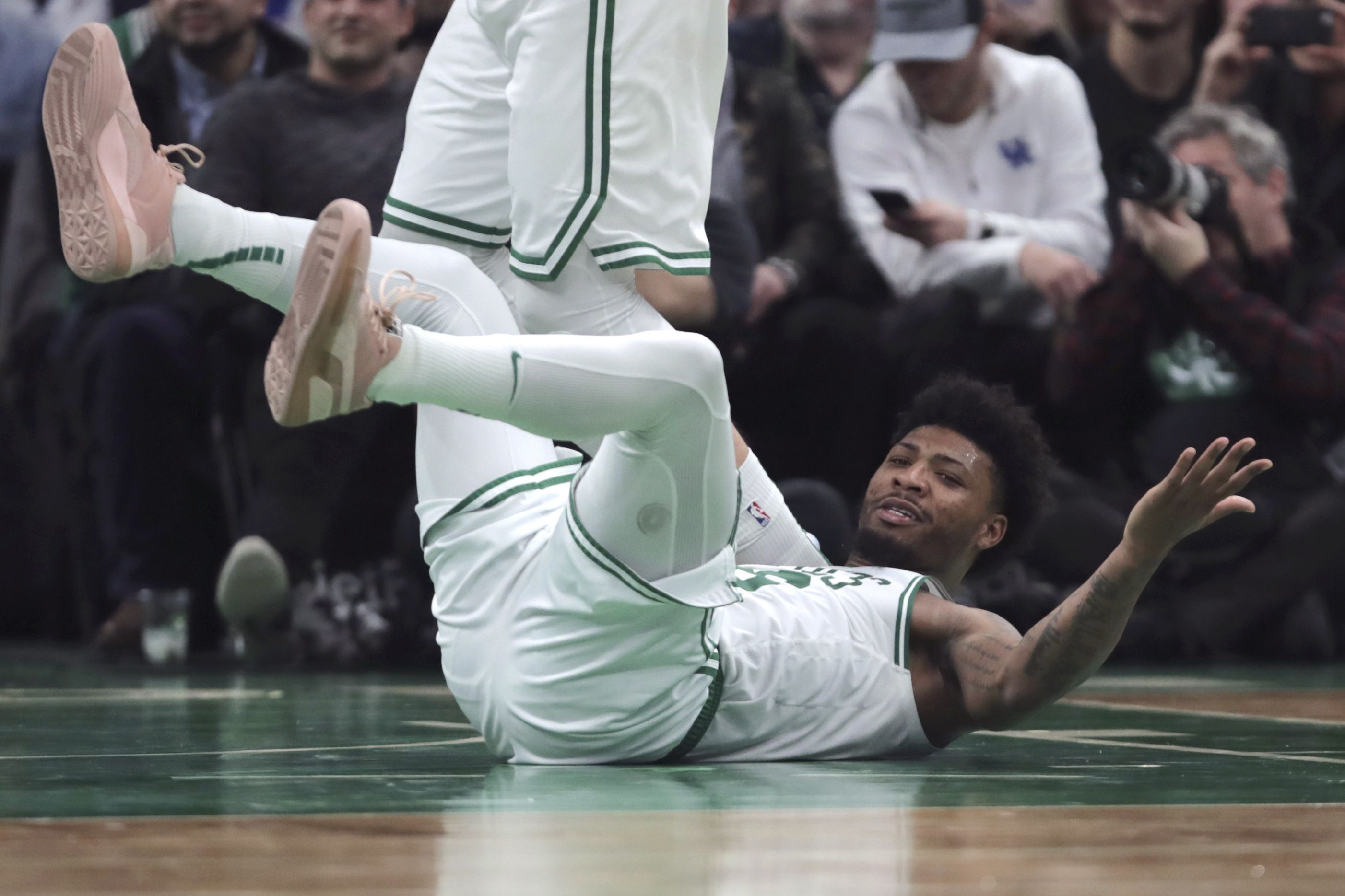 Celtics, minus Walker, bow to Wizards